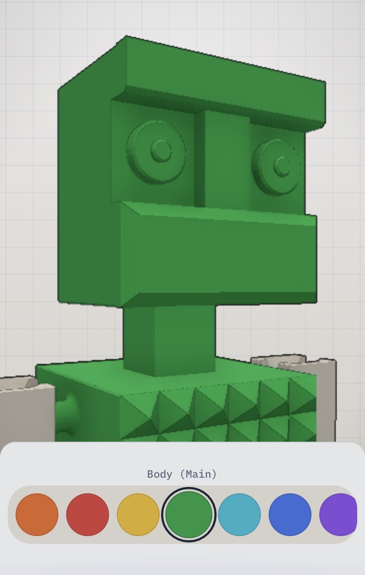 Cubie on a phone — a green character with studded texture, the colour palette open at the bottom in a sheet labelled Body (Main)