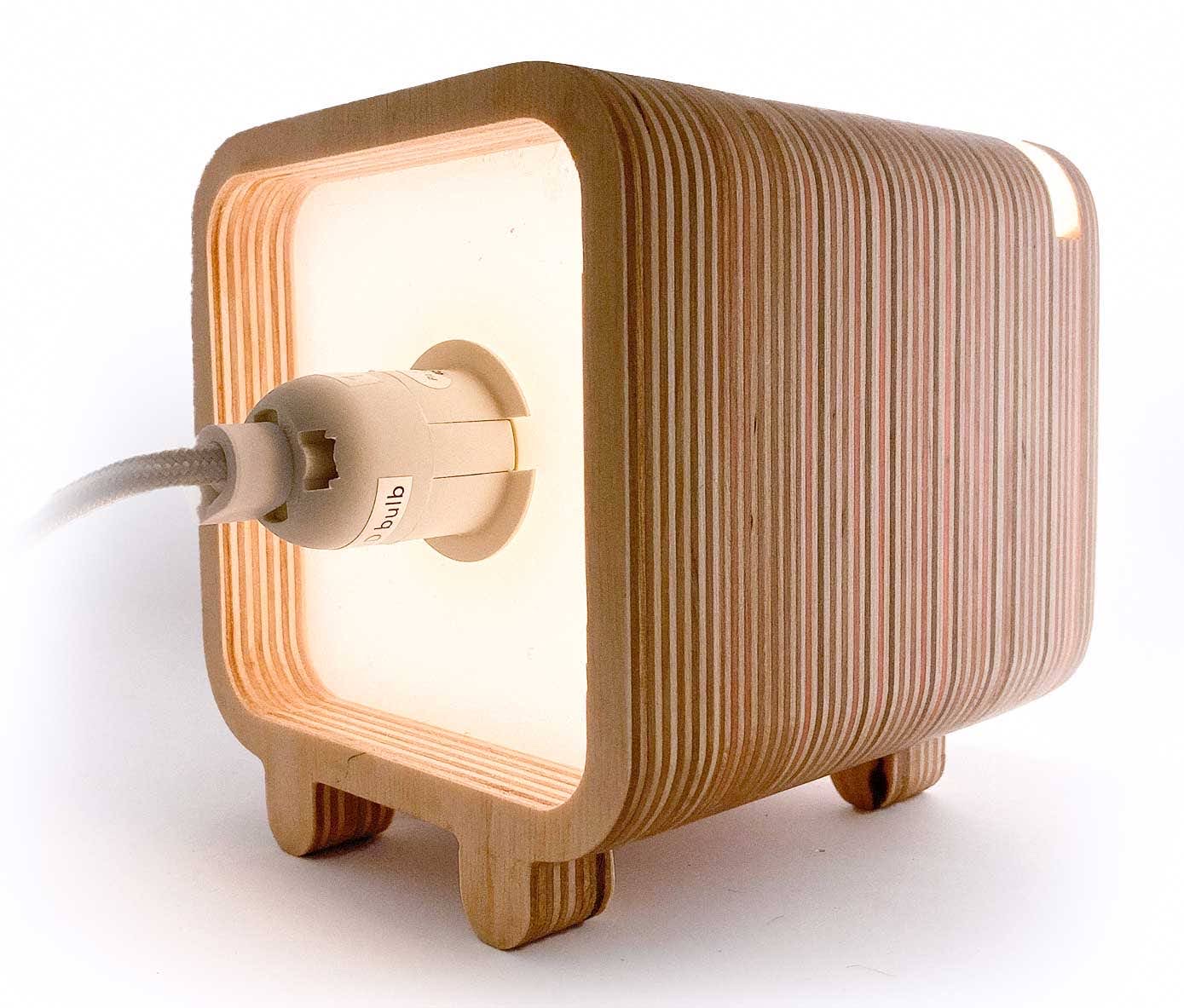 Inside a Lampun box, looking straight at the bulb and socket that lights it