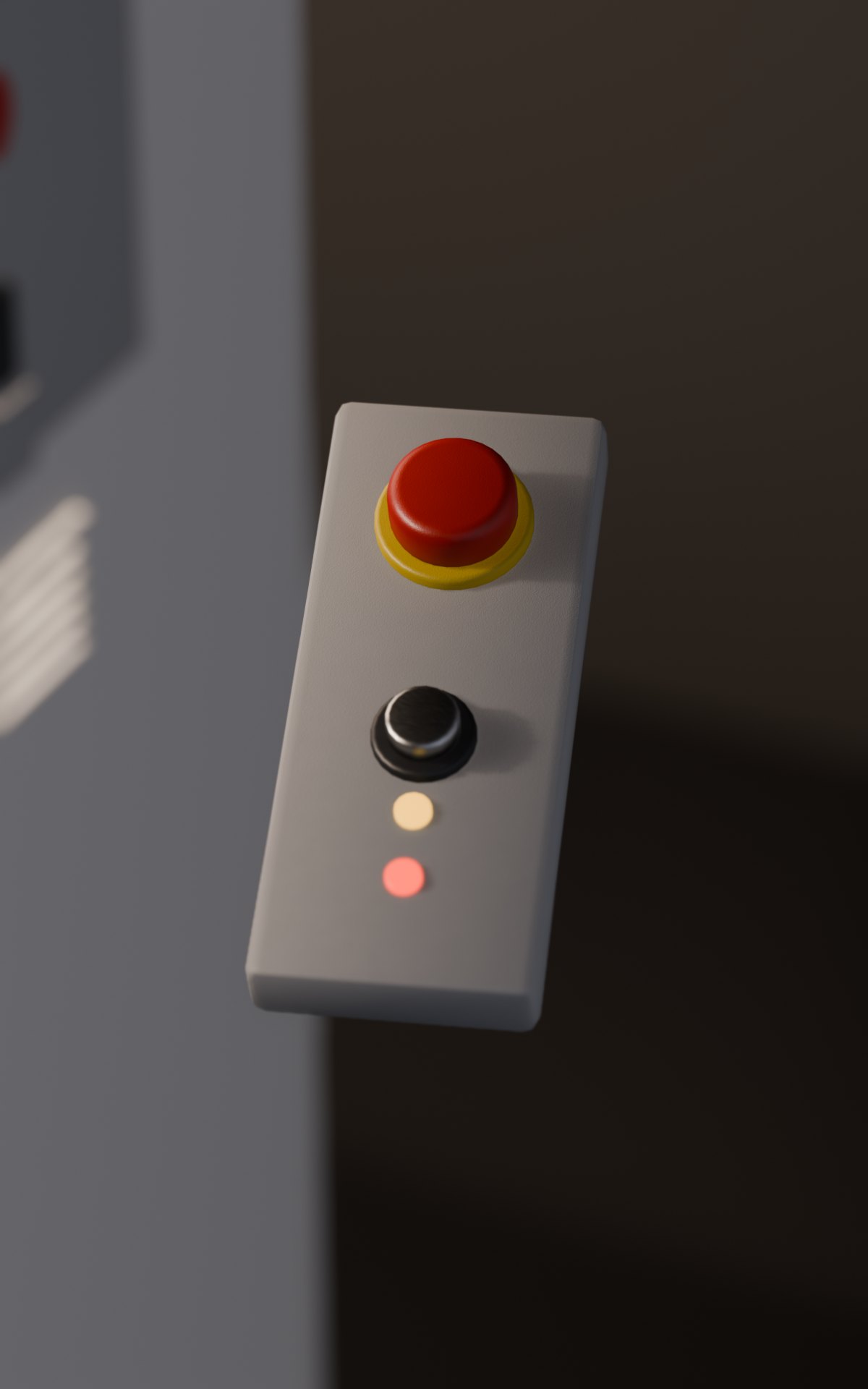 The red stop on its own console, beside the cell — hardware, not a button on the screen