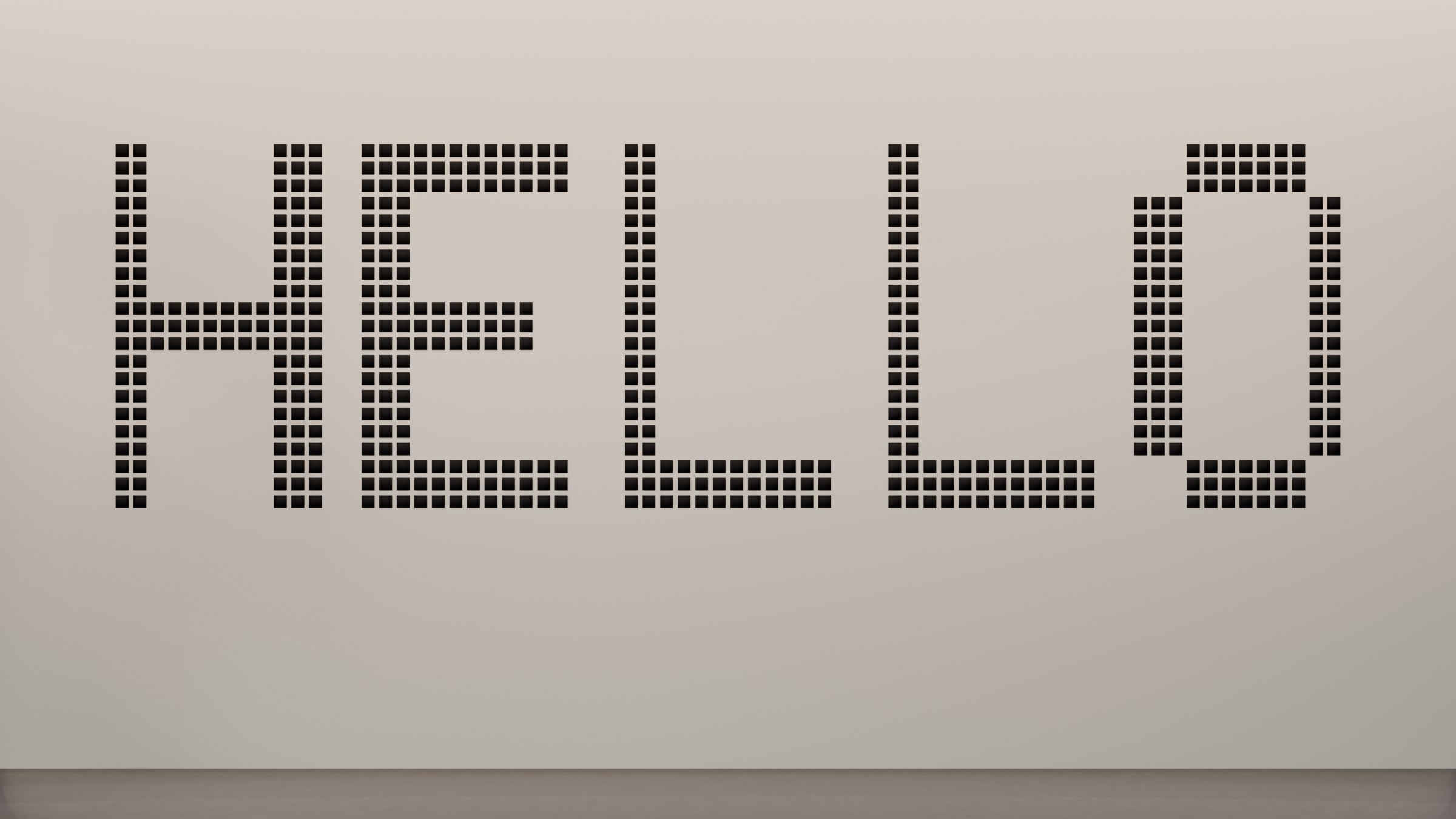 HELLO on the e-ink back wall, straight on, in its own dot-matrix pixels