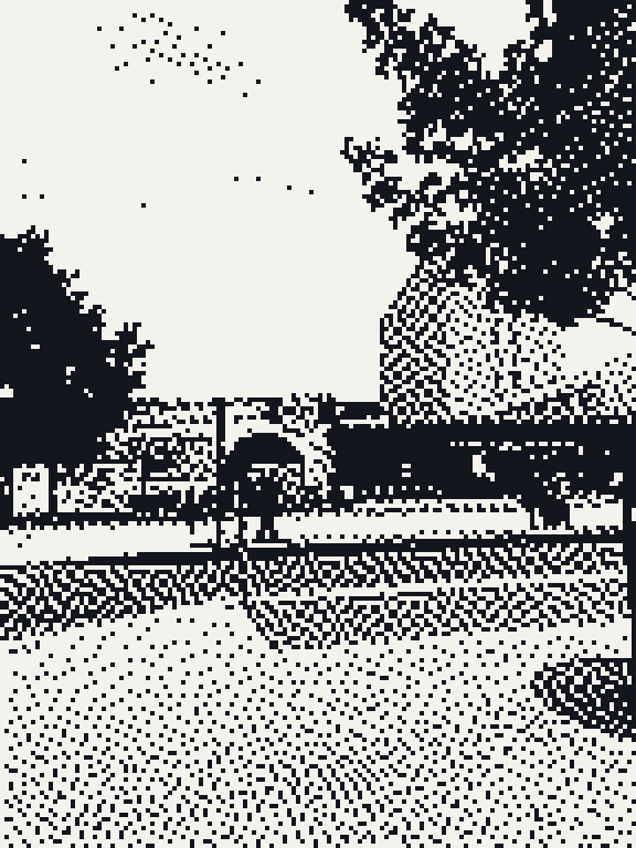 The same street with a tree and an arch, as the pilgrim sees it with the Dots effect.